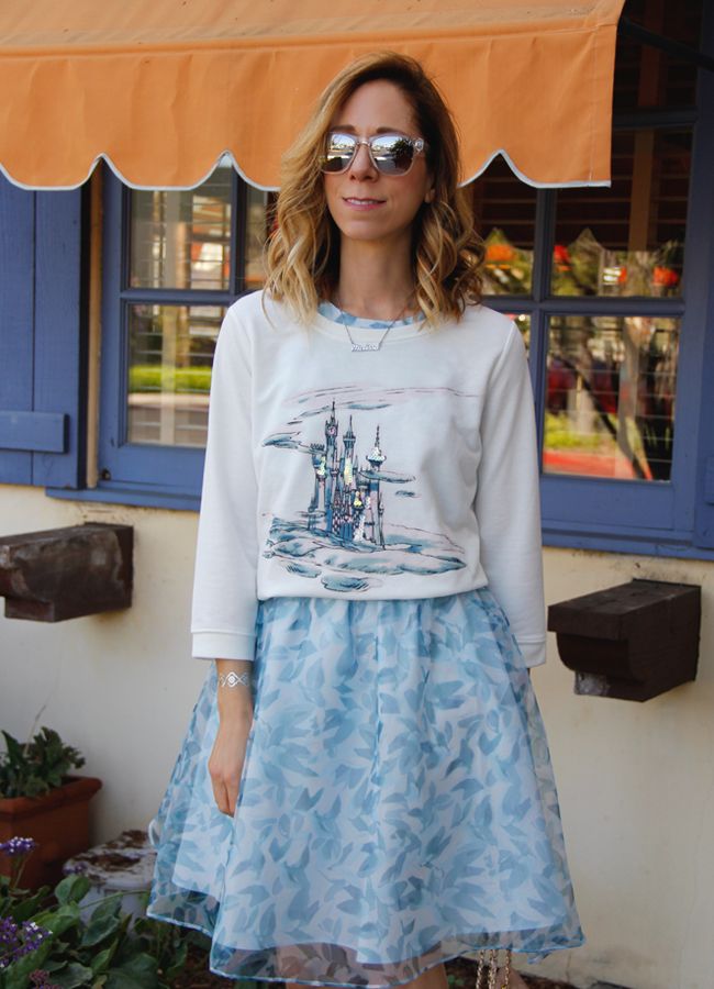 Fashion blogger The Key To Chic wears a LC Lauren Conrad Cinderella collection castle graphic sweatshirt and organza bow back dress.