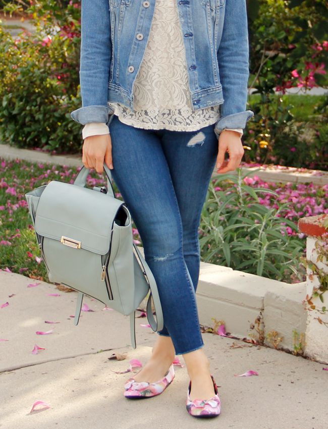 L.A. fashion blogger The Key To Chic wears an AG Jeans 'Robyn' denim jacket, Old Navy Rockstar denim, Sam & Libby floral Chelsea bow ballet flats, and a pastel green Phillip Lim inspired Mossimo backpack