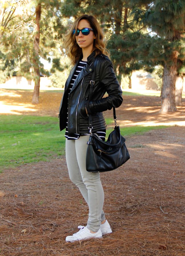 LA fashion and personal style blogger The Key To Chic wears a striped a.n.a. top, Michael Michael Kors leather moto jacket, grey J Brand skinny jeans, Kate Spade Cobble Hill Little Minka bag, and Adidas Superstar 2 sneakers