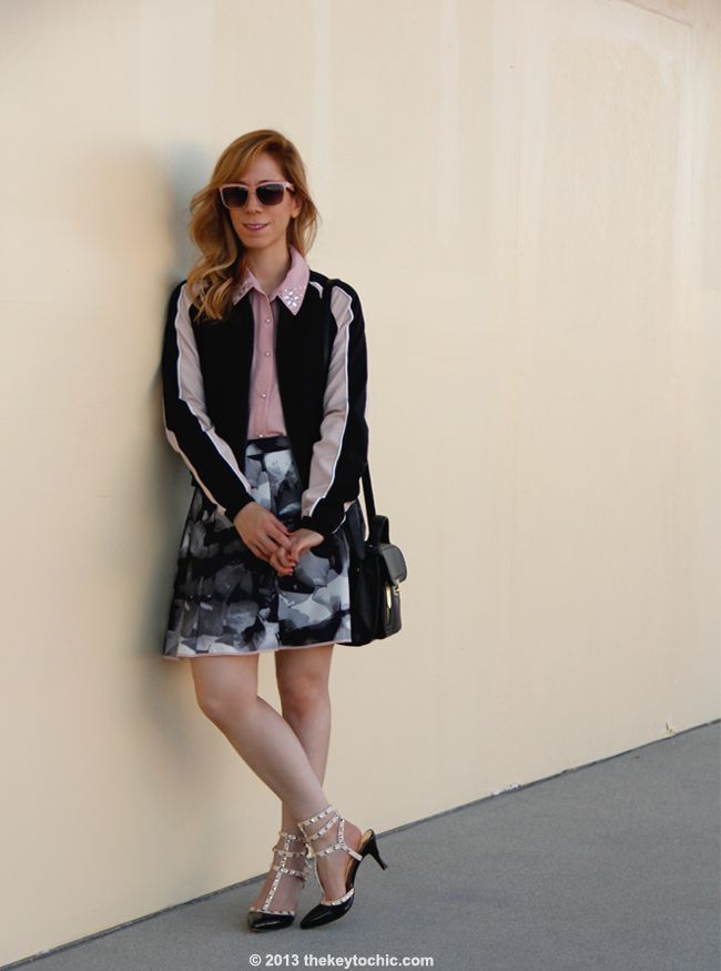 LA fashion blogger The Key To Chic wears a Mossimo colorblock bomber jacket and Mossimo printed scuba skirt with studded ankle strap heels and a black Phillip Lim for Target top handle satchel