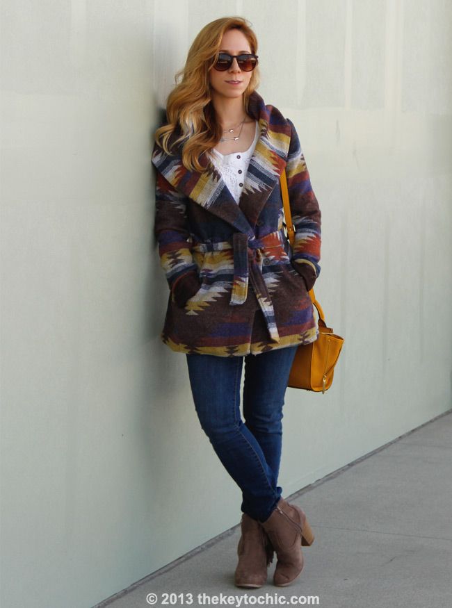 L.A. fashion blogger The Key To Chic wears Old Navy Rockstar jeans,a Phillip Lim for Target mini satchel, a Mossimo wrap coat, and Wet Seal fringe boots.