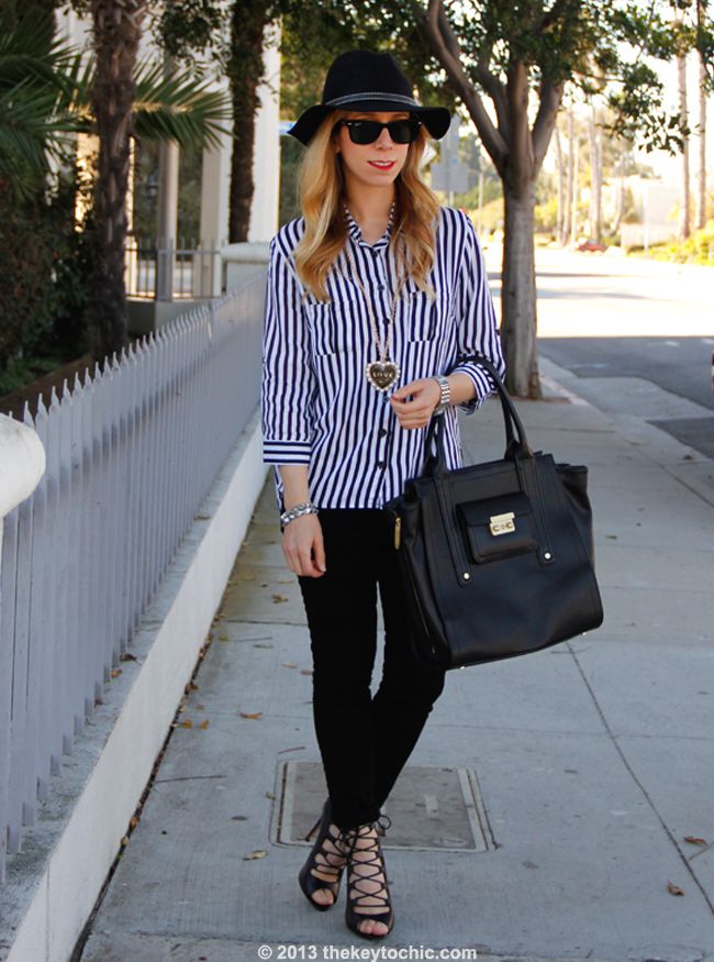 Los Angeles fashion blogger The Key To Chic wears a striped blouse from AMI Clubwear, J Brand skinny jeans, a Boohoo hat, Zara lace-up heels, and a Phillip Lim for Target tote bag