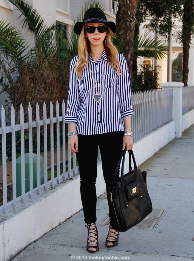 Los Angeles fashion blogger The Key To Chic wears a striped blouse from AMI Clubwear, J Brand skinny jeans, a Boohoo hat, Zara lace-up heels, and a Phillip Lim for Target tote bag