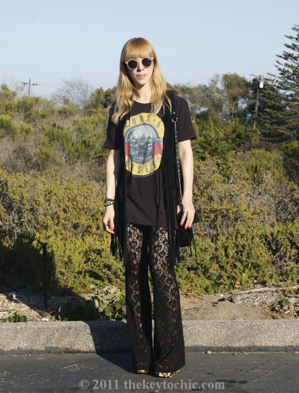 Suede fringe vest, lace bell bottoms, studded bag, Steve Madden Wicked leopard wedges, Los Angeles fashion blog