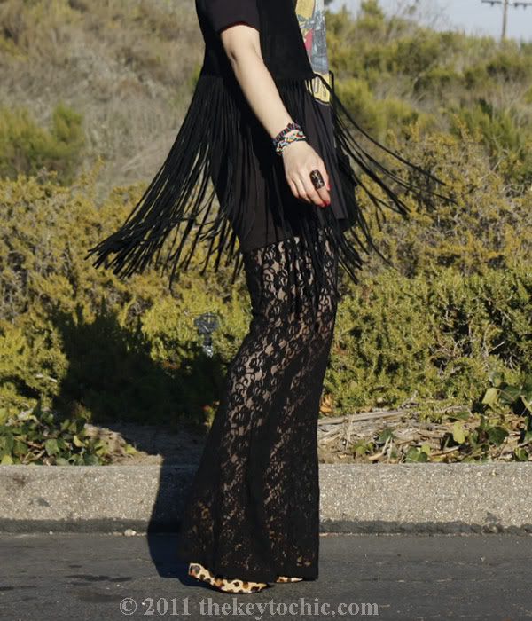 Suede fringe vest, lace bell bottoms, studded bag, Steve Madden Wicked leopard wedges, Los Angeles fashion blog
